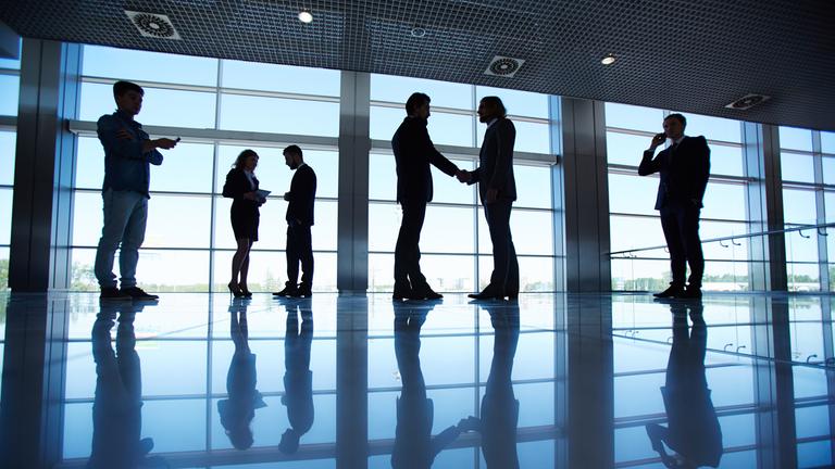 Symbolbild: Geschäftsleute bei einem Meeting