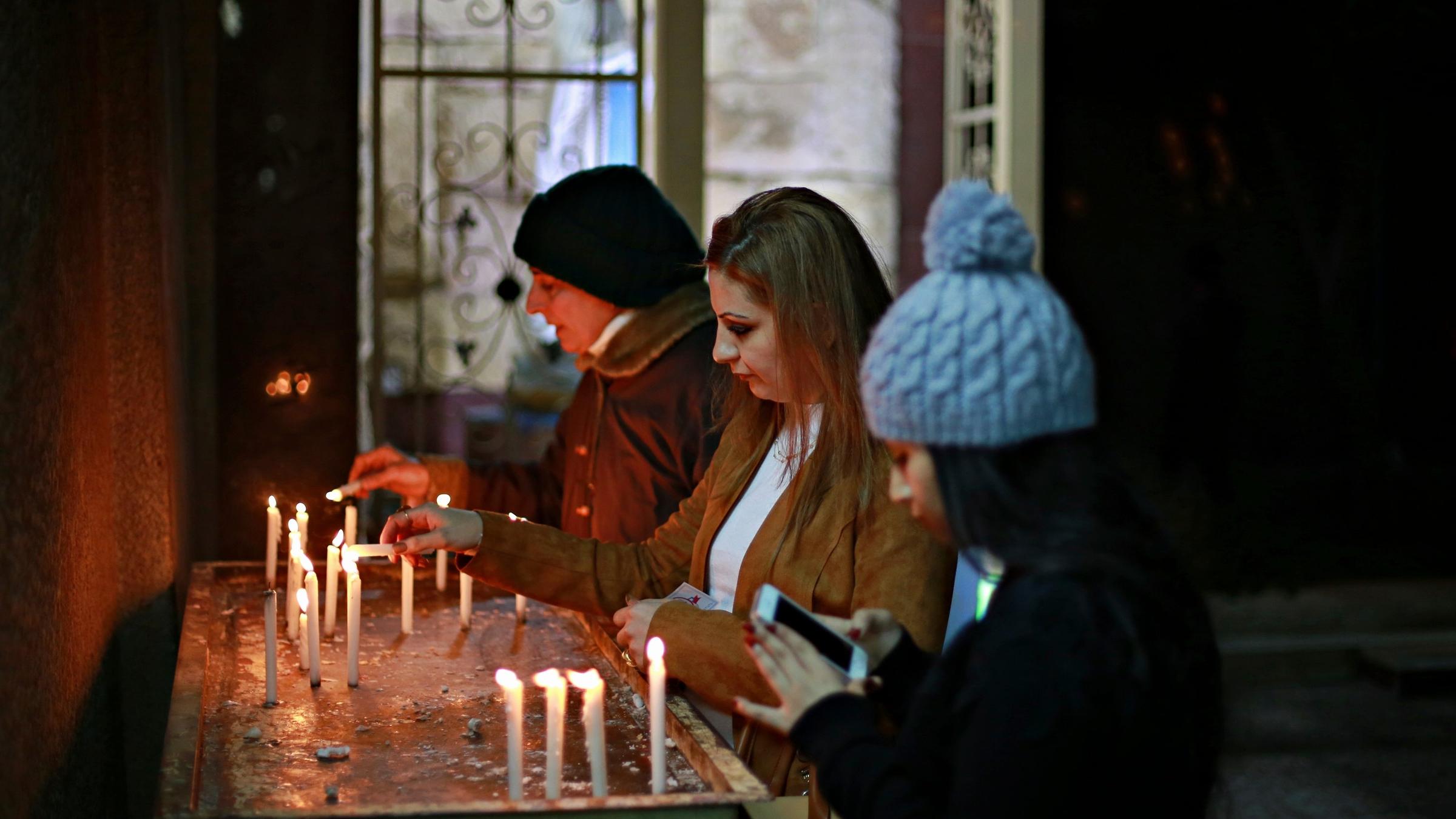 Irak: Kerzen nach der Messe