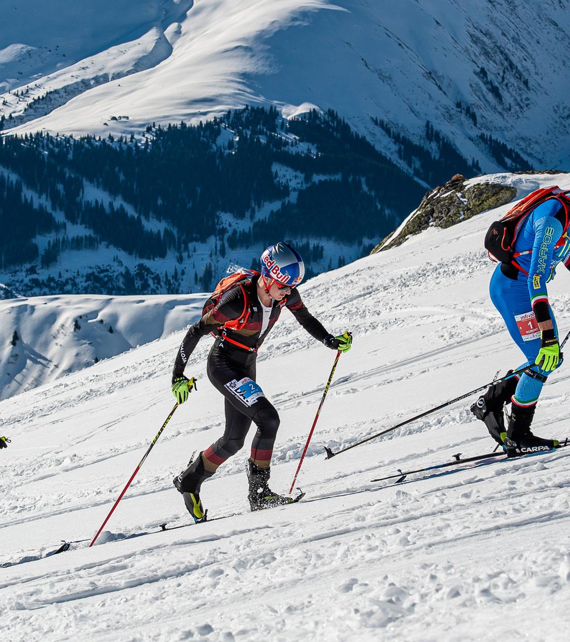 schweiz, disentis: toni palzer (m) aus deutschland laeuft beim weltcup ski mountaineering hinter robert antonioli (r) aus italien. 