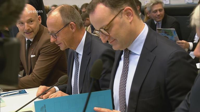 Spahn und Merz im Bundestag