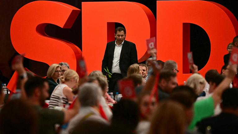 The co-leader of Germany's Social Democratic Party (SPD) Lars Klingbeil is seen in front of his party's logo during the SPD's party congress in Berlin.