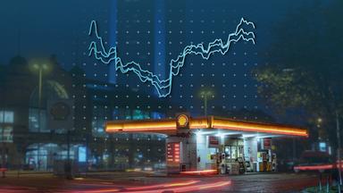 Eine Tankstelle bei Nacht, darüber eine Grafik zu den Spritpreisen in Deutschland
