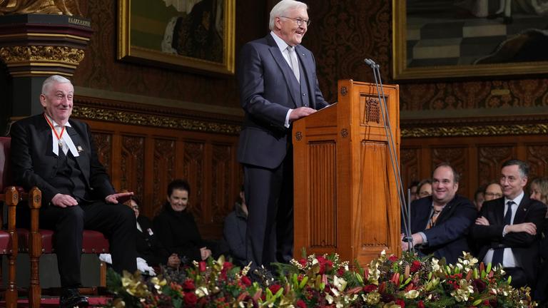 German President Frank-Walter Steinmeier speaks to a joint session of Members of Parliament, in the Royal Gallery