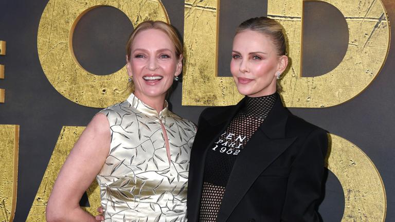 Uma Thurman & Charlize Theron