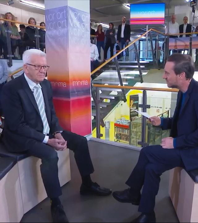 Winfried Kretschmann und Andreas Wunn (rechts)