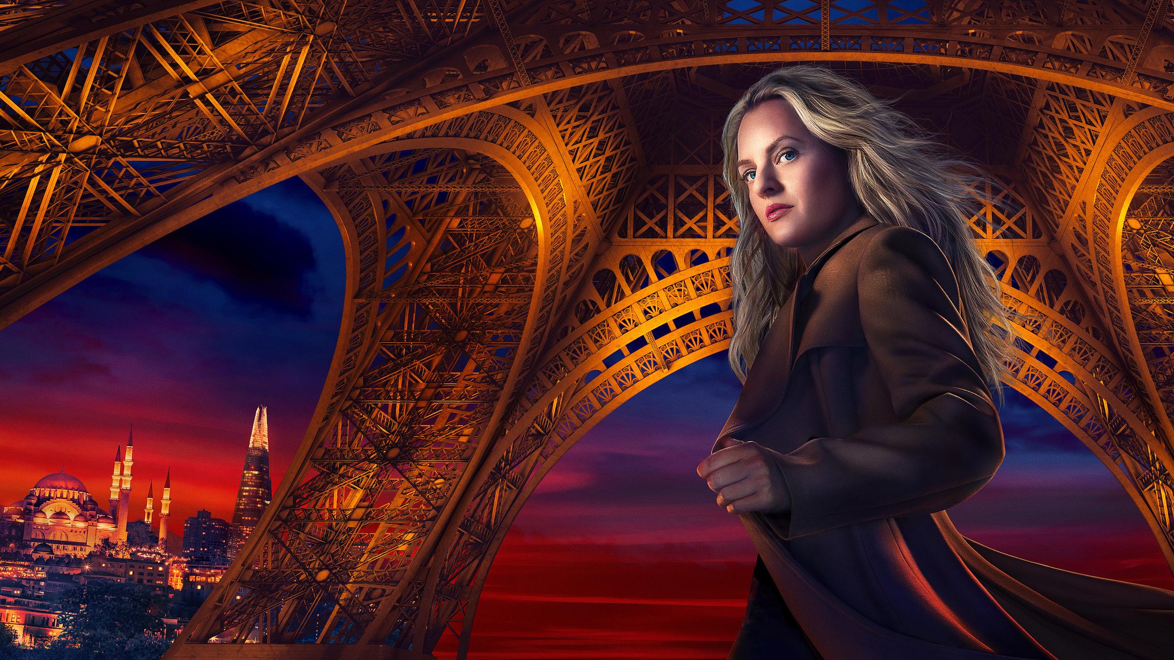 Imogen Salter schaut in die Kamera. Im Hintergrund sieht man den unteren Teil des Eiffelturms.