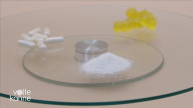 verschiedene Probiotika-Produkte: Kapseln, Pulver, Gummibärchen