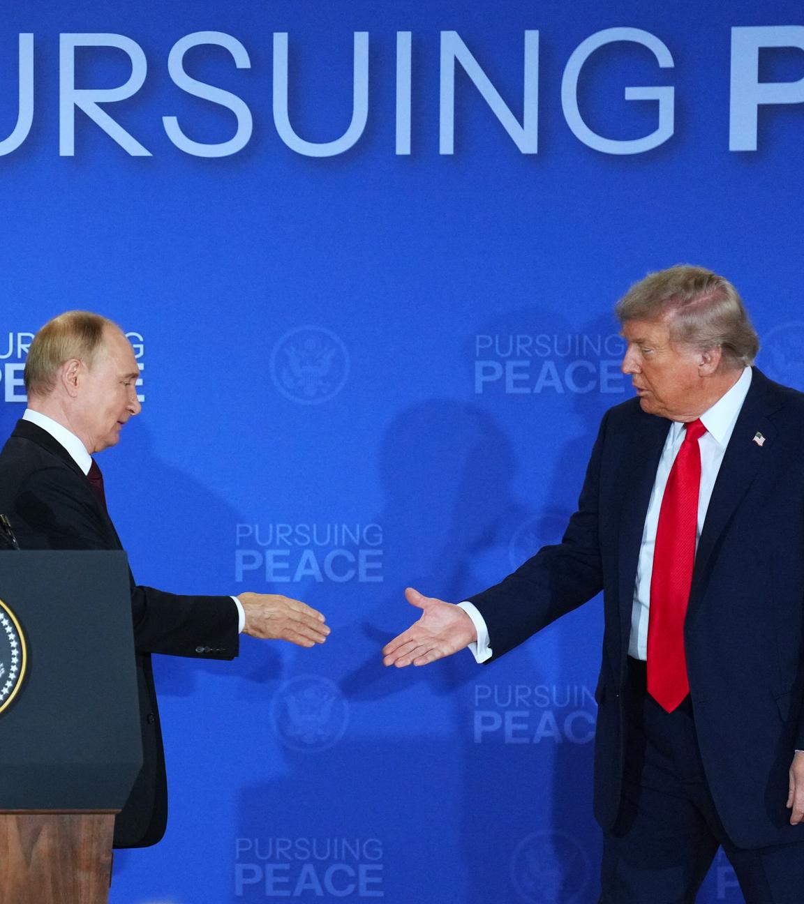 U.S. President Donald Trump (R) and Russian President Vladimir Putin attend a joint press conference after concluding their talks in Anchorage, Alaska, the United States, on Aug. 15, 2025.