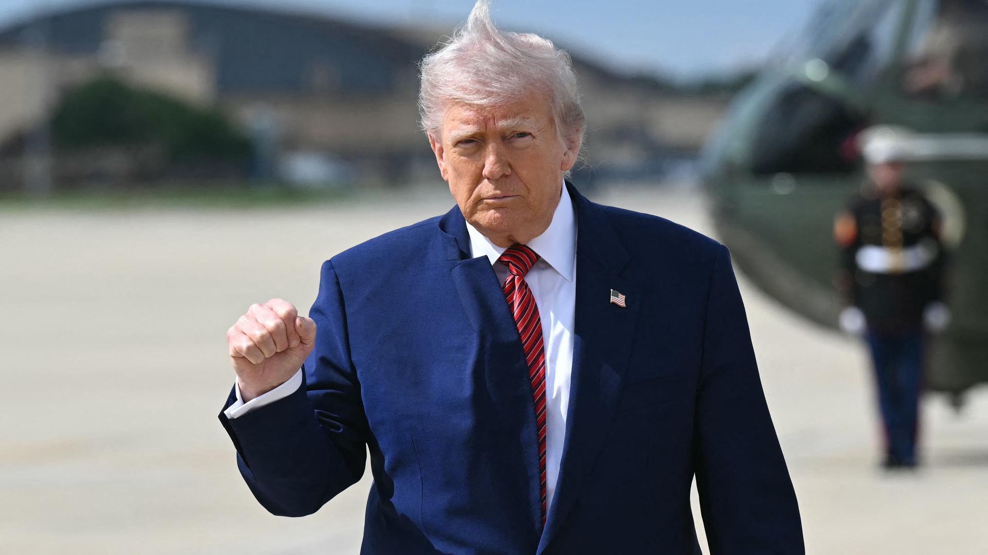 US president Donald Trump departs the White House