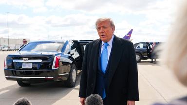 President Donald Trump stops to speak to members of the press as he arrives at Cincinnati/Northern Kentucky International Airport on October 17, 2026 in Hebron, Kentucky.