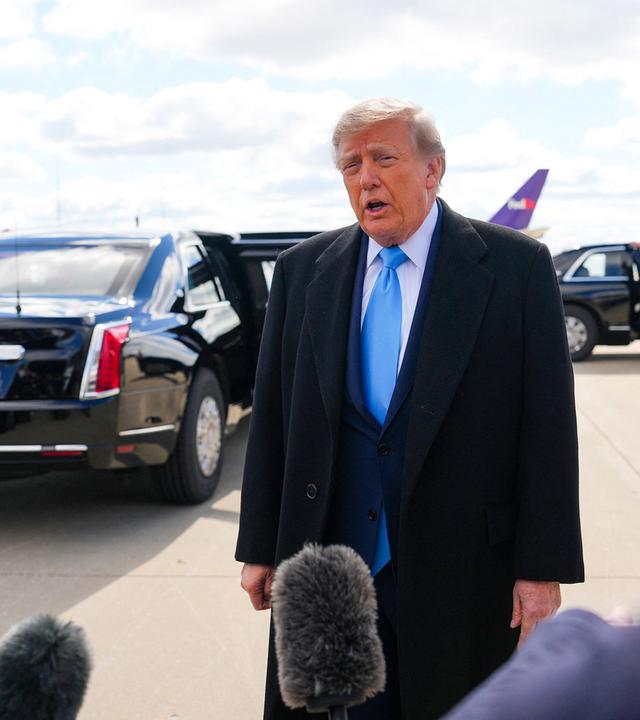President Donald Trump stops to speak to members of the press as he arrives at Cincinnati/Northern Kentucky International Airport on October 17, 2026 in Hebron, Kentucky.