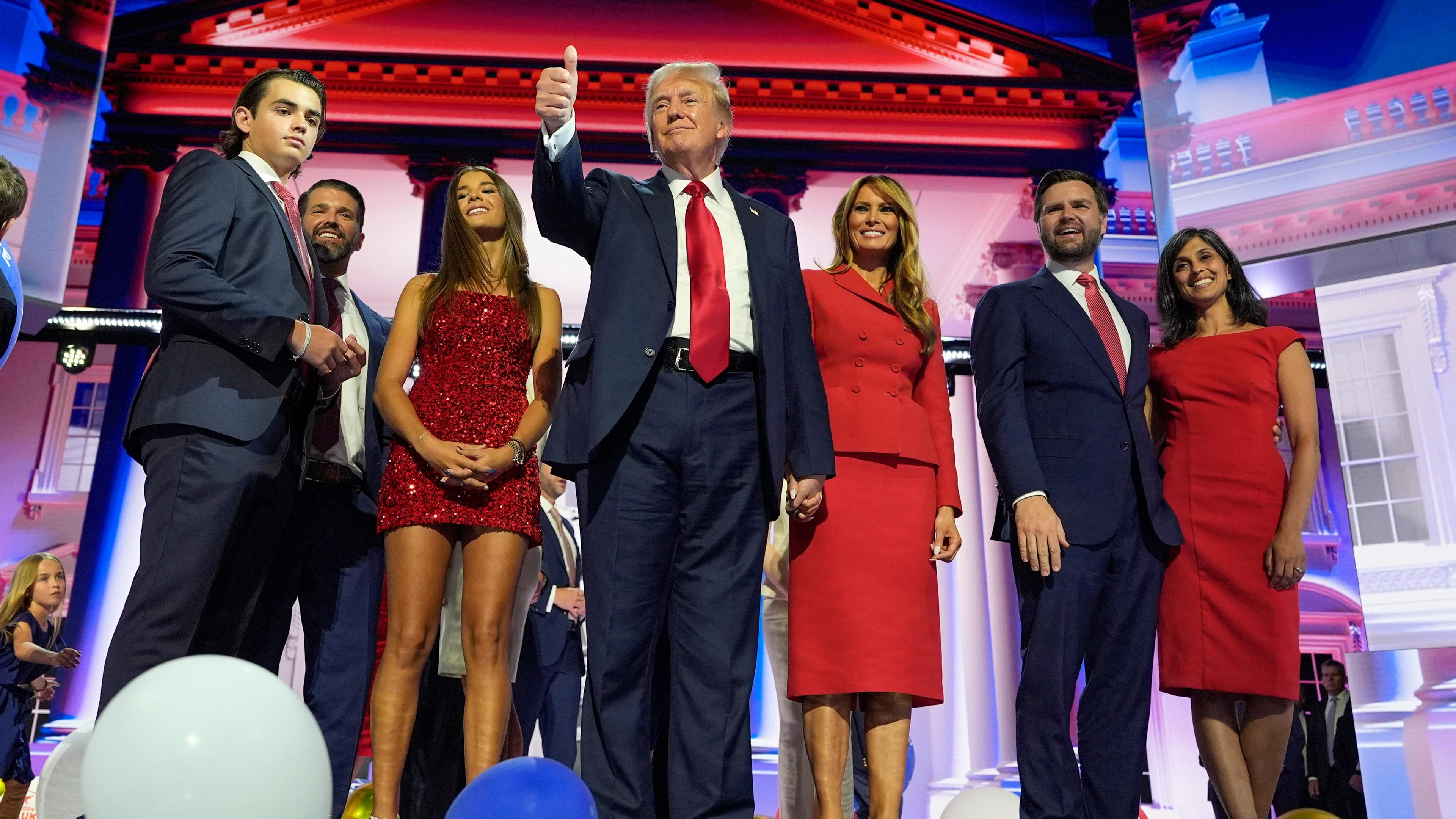 Republican presidential candidate former President Donald Trump stands on stage with former first lady Melania Trump, family members and Republican vice presidential candidate Sen. JD Vance, R-Ohio, and his wife Usha Chilukuri Vance, during the 2024 Republican National Convention at the Fiserv Forum, Thursday, July 18, 2024, in Milwaukee.Republican presidential candidate former President Donald Trump stands on stage with former first lady Melania Trump, family members and Republican vice presidential candidate Sen. JD Vance, R-Ohio, and his wife Usha Chilukuri Vance, during the 2024 Republican National Convention at the Fiserv Forum, Thursday, July 18, 2024, in Milwaukee.