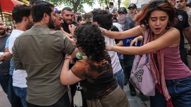 Turkish anti riot police officers clash with protesters during a demonstration against the arrests and growing targeting of LGBTQ activists in Ankara, on September 15, 2026. Turkish police arrested dozens of people on September 13 in gay bars and at the homes of LGBTQ activists on charges including "obscenity", "assisting prostitution" and having "financial links abroad". Authorities have blocked social media accounts belonging to human rights defenders and media outlets as part of operations dubbed "My Family Is Safe.