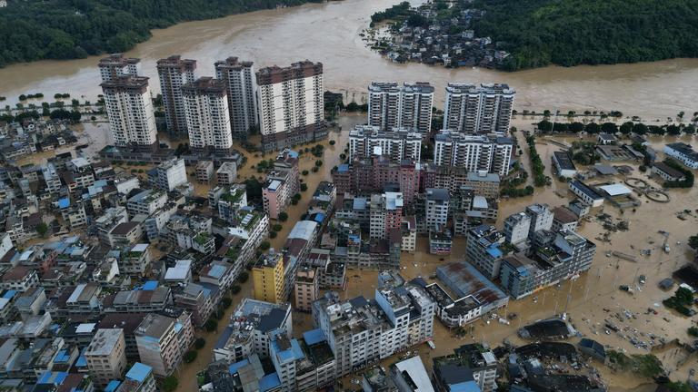 An aerial drone photo shows the flood-stricken Rongjiang County, southwest China s Guizhou Province, June 28, 2025. 