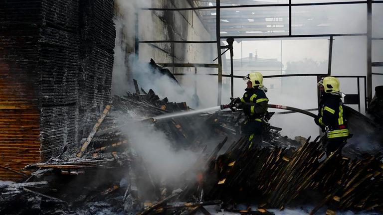 Russian forces launched an overnight large-scale combined attack with at least 13 missiles and 728 drones across Ukraine