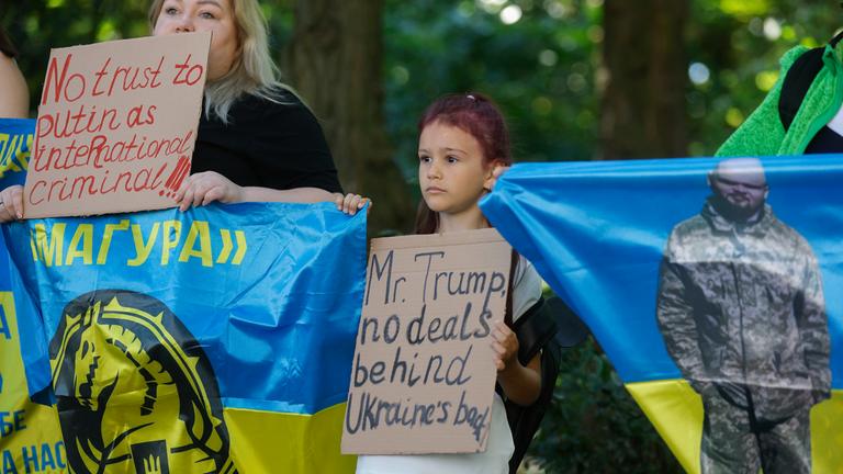 Ukrainians, including families of prisoners of war (POWs) and missing persons, participate in a rally called 'No land swap! 