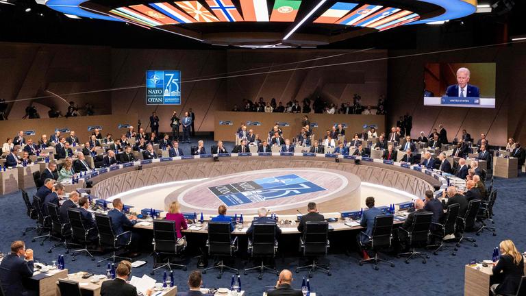 US President Joe Biden speaks during the meeting of the North Atlantic Council at the level of Heads of State and Government during the NATO 75th anniversary summit at the Walter E. Washington