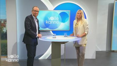 Dr. Christoph Specht und Nadine Krüger am Tisch