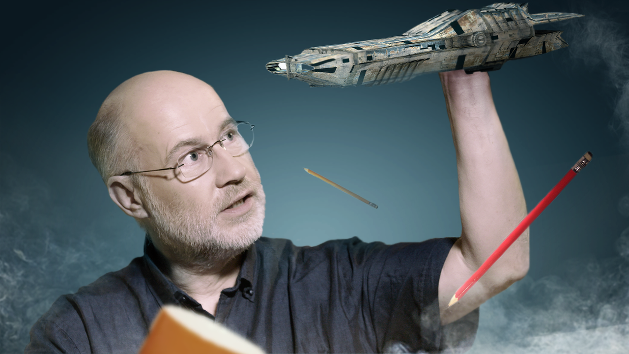 Harald Lesch spielt mit einem Raumschiff