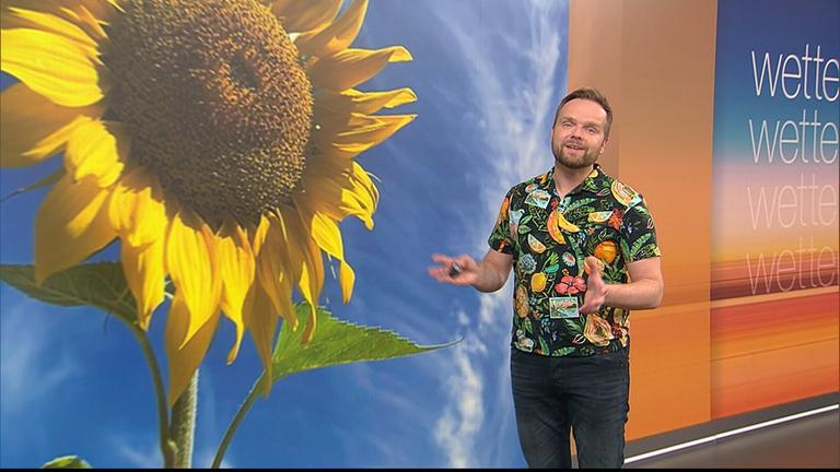 Benjamin Stöwe präsentiert das Wetter