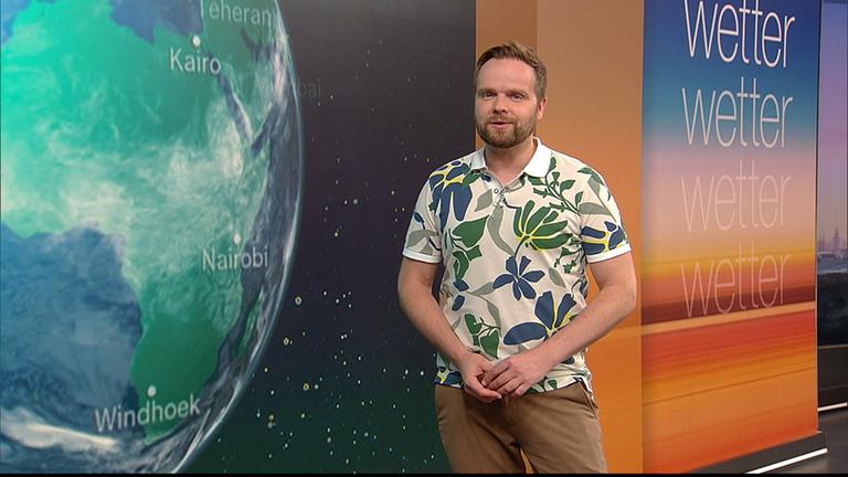 Benjamin Stöwe präsentiert das Wetter