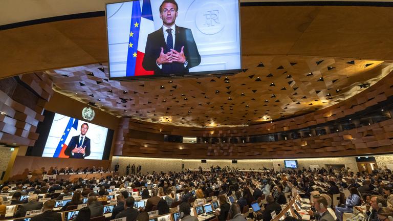 French President Emmanuel Macron delivers a statement via a video call about the adoption of the WHO Pandemic Agreement