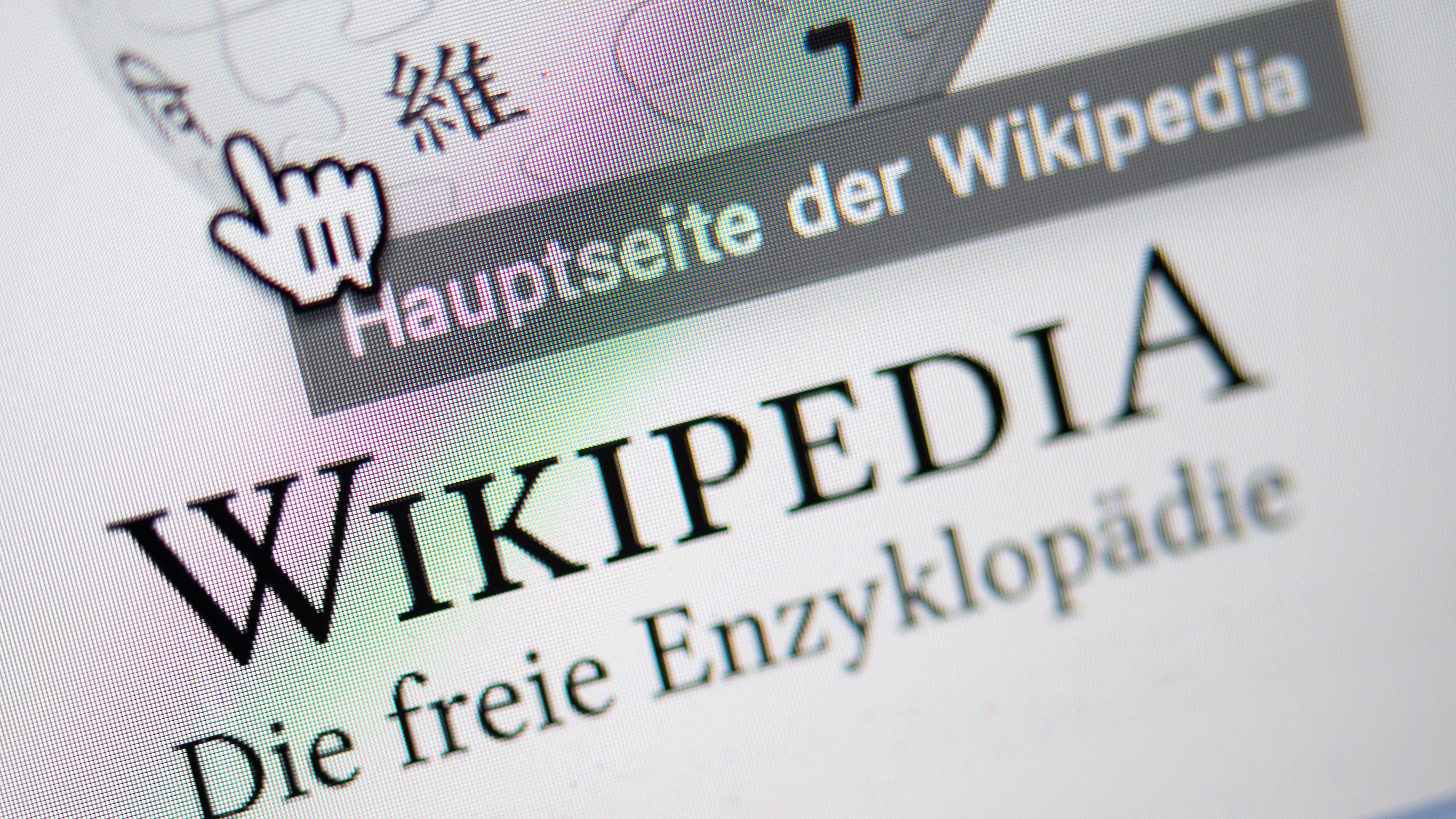 Wikipedia Logo und Schriftzug