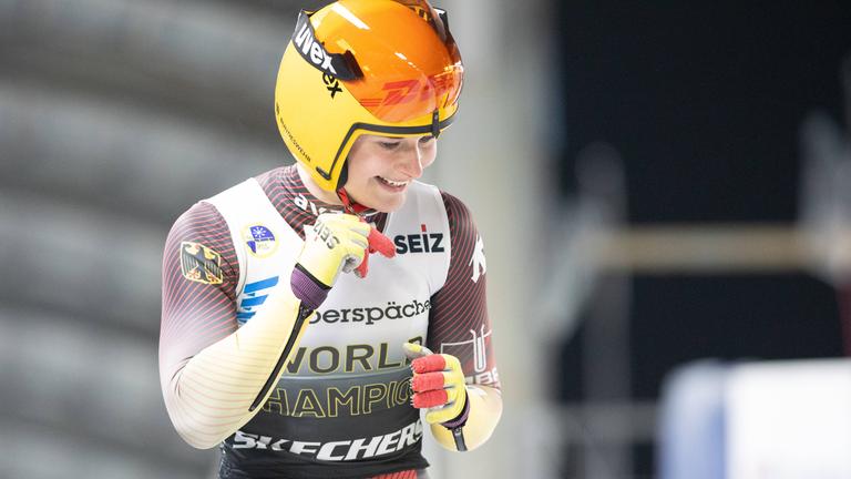 Deutschlands Julia Taubitz freut sich nach ihrem Lauf.