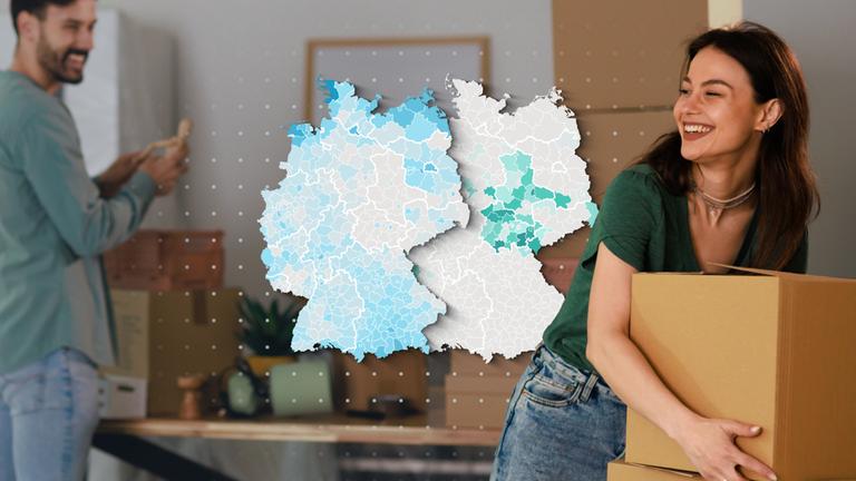 Paar mit Umzugskartons und Deutschland-Karten die zeigen, wo Mieten und wo Kaufen günstiger ist