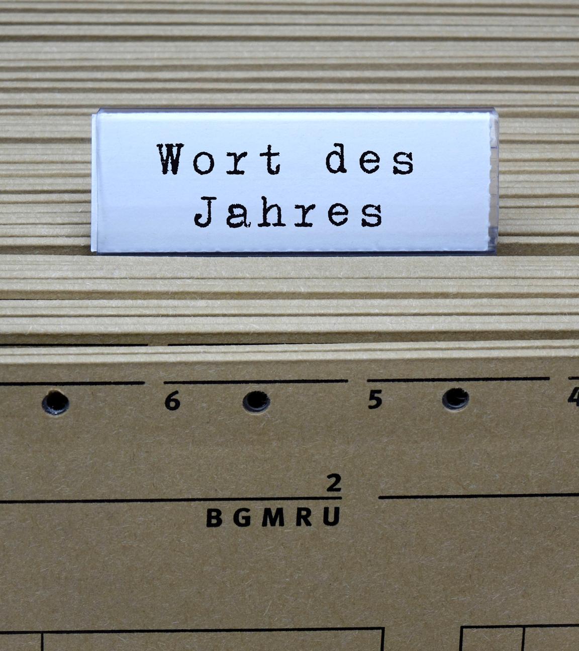 Symbolbild: Hängeregister und Wort des Jahres