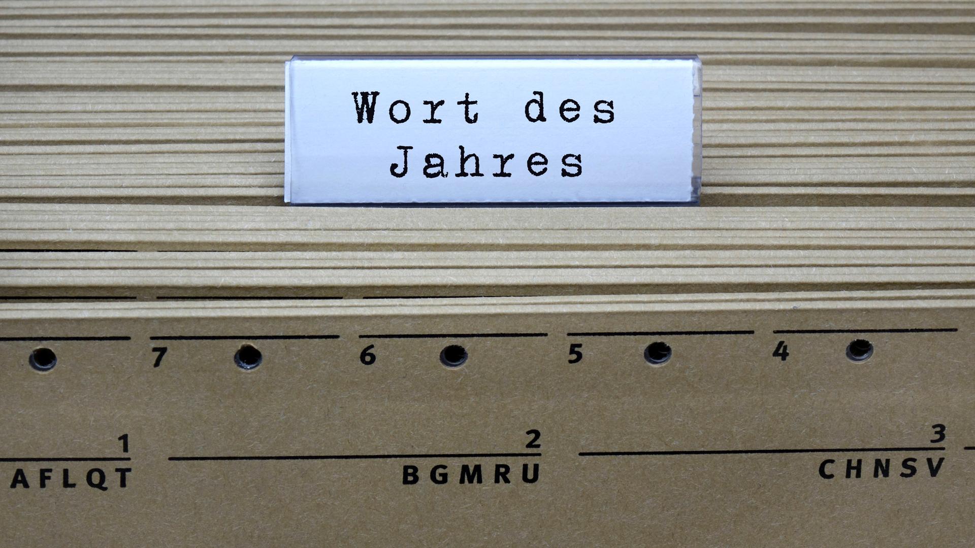 Symbolbild: Hängeregister und Wort des Jahres