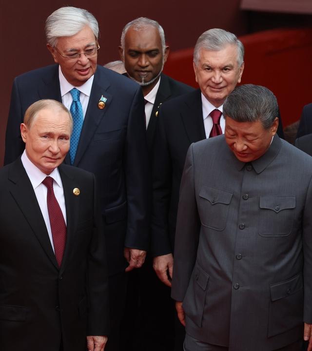 Wladimir PUTIN (Praesident Russland),Chinas Prasident Xi Jinping und Nordkoreas Machthaber Kim Jong Un.